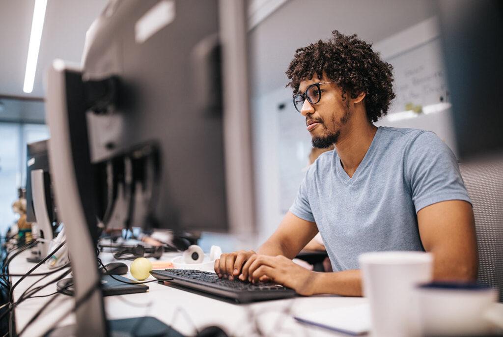 Man sitting at computer in office