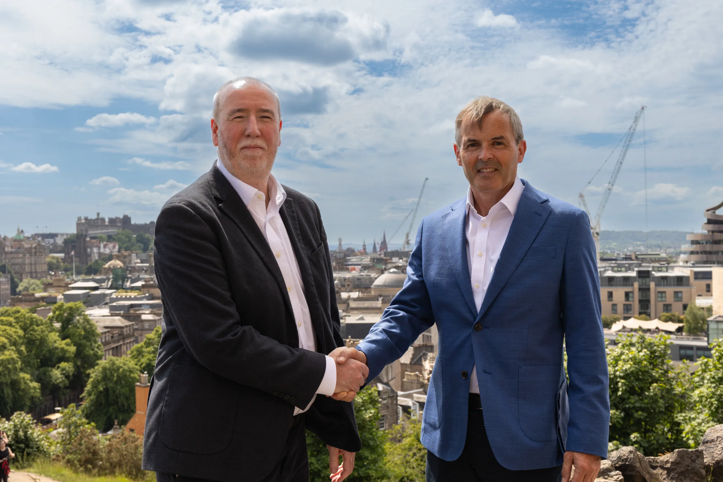 Ewan Ferguson Paul Rellis handshake